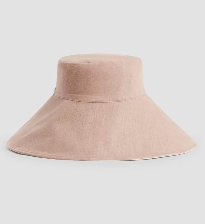 Light Pink wide-brimmed hat on a light gray background